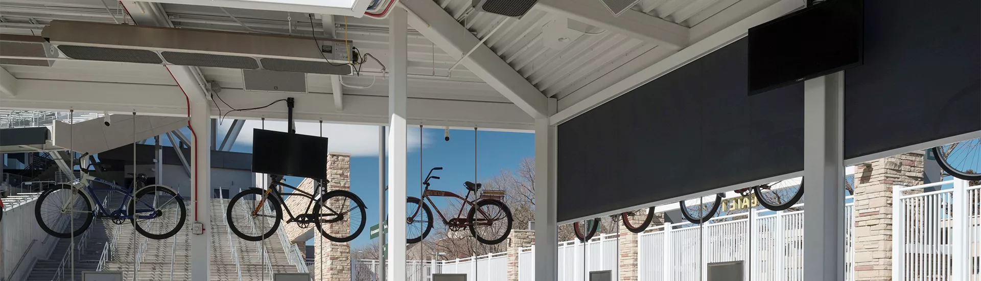 Motorized FlexShade ZIP exterior roller shades at the New Belgium Porch at Colorado State University.